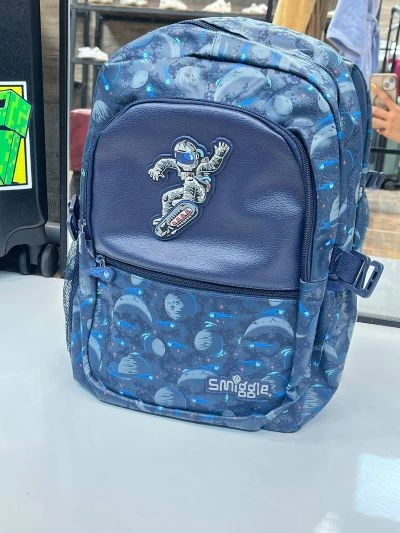 خرید کوله پشتی بچه گانه اسمیگل طرح ادم فضایی